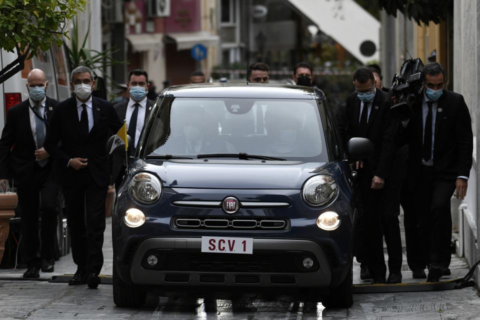 Pope Francis arrives at the Archbishopric of Greece in Athens, Saturday, Dec. 4, 2021. Pope Francis warned Saturday that the "easy answers" of populism and authoritarianism threaten democracy in Europe and called for fresh dedication to promoting the common good. (AP Photo/Michael Varaklas)