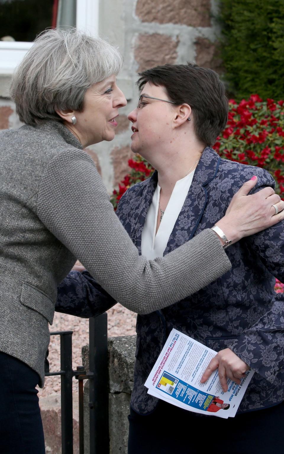 Theresa May with Scottish Conservative leader Ruth Davidson on the election campaign trail in the village of Banchory, Aberdeenshire - Credit: PA