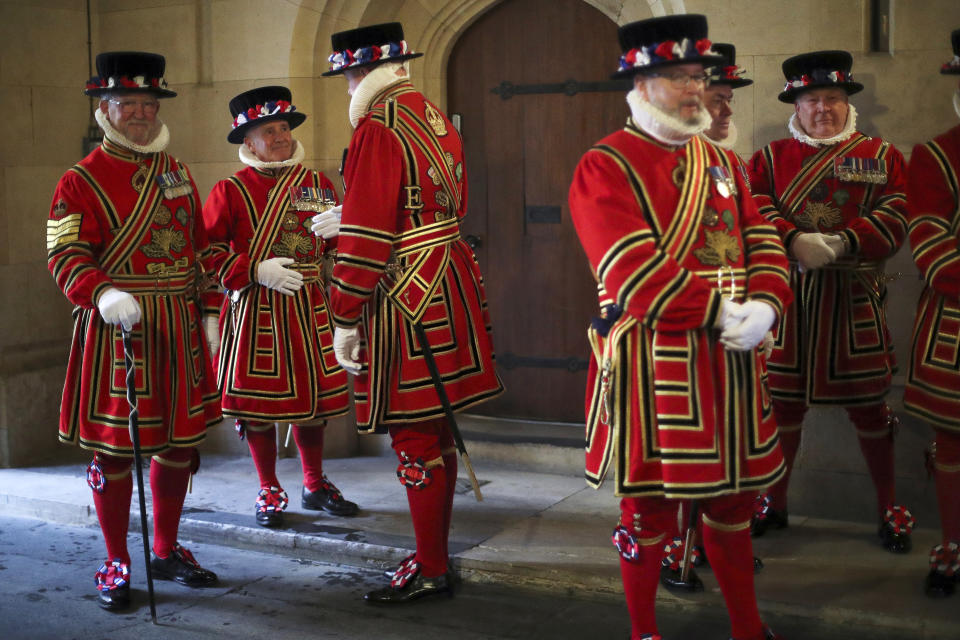 Members of the Yeoman Guard ahead of the official State Opening of Parliament in London, Monday Oct. 14, 2019. (Hannah McKay/Pool via AP)