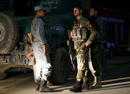 Afghan security forces arrive at the site of an attack in Kabul May 13, 2015. REUTERS/Omar Sobhani