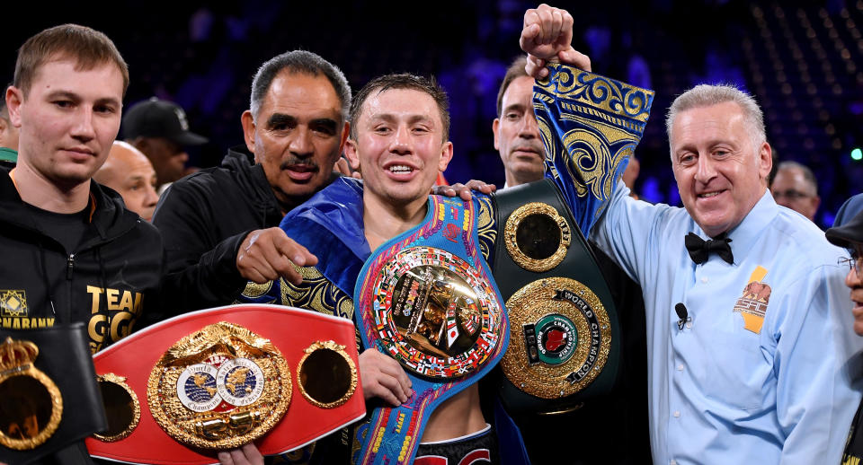 Gennady Golovkin poses with his belts after a second round knockout win over Vanes Martirosyan at StubHub Center on May 5, 2018 in Carson, California. (Getty Images)