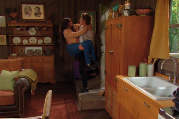 Finally, Johnny and Chanel arrive at the Horton cabin. As a romantic gesture, Johnny carries Chanel across the threshold.