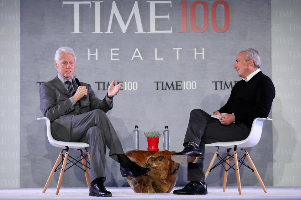 Former U.S. President Bill Clinton (L) speaks with CEO of the Lawrence J. Ellison Institute for Transformative.Medicine of USC and TIME 100 Health Summit Co-Chair, Dr. David Agus, onstage during the TIME 100 Health Summit at Pier 17 in New York City on Oct. 17, 2019. | Brian Ach—Getty Images for TIME 100 Health