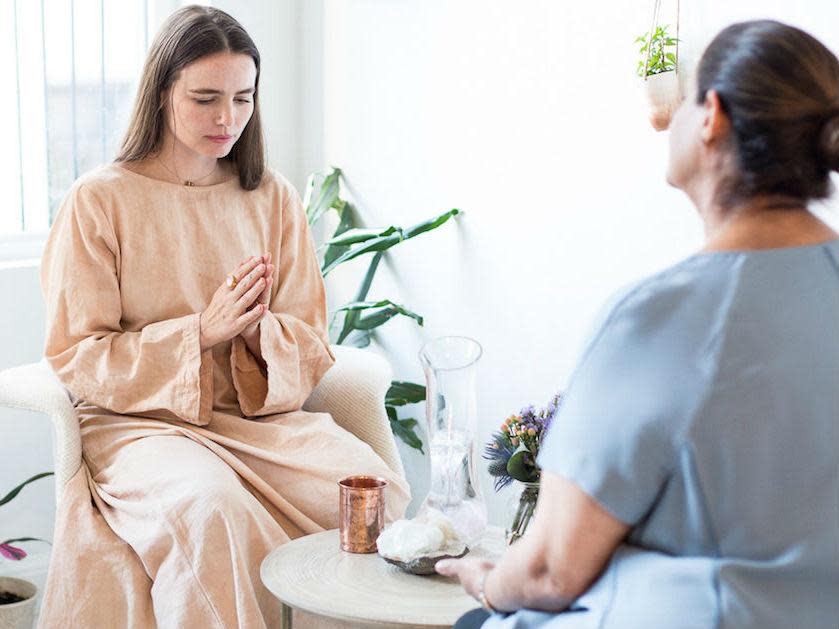 Deborah Hanekamp, a self-described 'seeress' and energy healer, sees a client in her New York City studio: Stevi Sesin