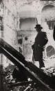 Winston Churchill inspecting bomb damage in the House of Commons debating chamber on May 11, 1941.