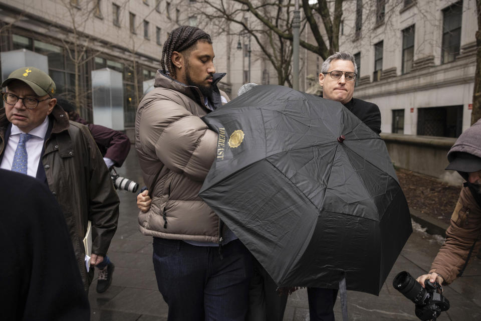 Joe Lewis leaves Manhattan Federal court, Wednesday, Jan. 24, 2024, in New York. Lewis pleaded guilty Wednesday to insider trading and conspiracy charges in New York, just six months after he was charged. Lewis’ family trust owns the Tottenham Hotspur soccer team. (AP Photo/Yuki Iwamura)