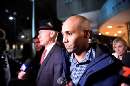 Former Minneapolis police officer Mohamed Noor and his attorney Tom Plunkett (L) leave the Hennepin County jail after posting bail in Minneapolis, Minnesota, U.S. March 21, 2018.  REUTERS/Craig Lassig