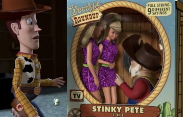 woody in shock at seeing two barbie's inside the stinky pete toy box