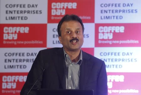 FILE PHOTO: V.G. Siddhartha, chairman of Coffee Day Enterprises Ltd, speaks during a news conference in Mumbai