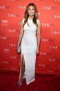 <p>Melania showed how it's done at the Time 100 Gala in a showstopping white gown with a thigh-high slit and cut-out detailing. Sparkly silver stilettos finished the look. <i>[Photo: Getty]</i> </p>