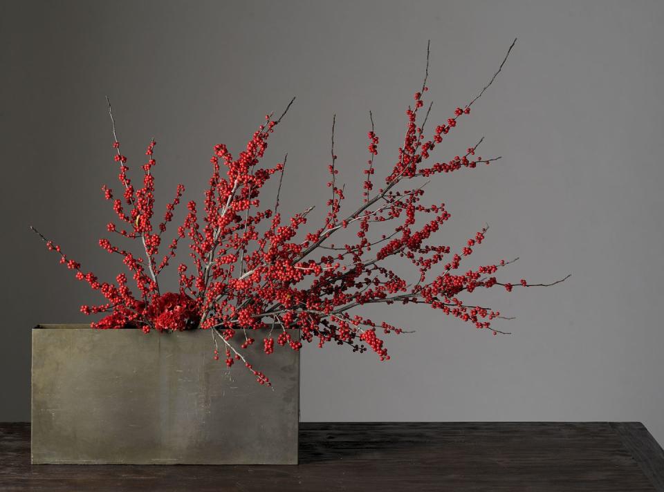 <p>Go the modern route this year by styling just a few berry branches in an elegant box vase.</p><p><em>Via <a href="http://www.decorationinc.com" rel="nofollow noopener" target="_blank" data-ylk="slk:Decoration Inc.;elm:context_link;itc:0;sec:content-canvas" class="link ">Decoration Inc.</a></em></p>