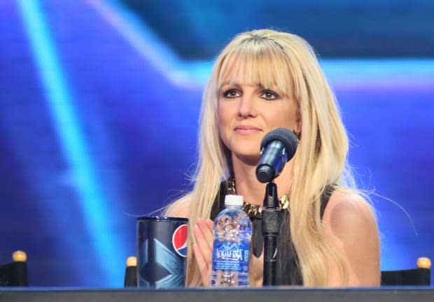 Britney Spears attends "The X Factor" season finale press conference at CBS Studios on Dec. 17, 2012, in Los Angeles.<p><a href="https://www.gettyimages.com/detail/158495652" rel="nofollow noopener" target="_blank" data-ylk="slk:JB Lacroix/Getty Images;elm:context_link;itc:0;sec:content-canvas" class="link ">JB Lacroix/Getty Images</a></p>