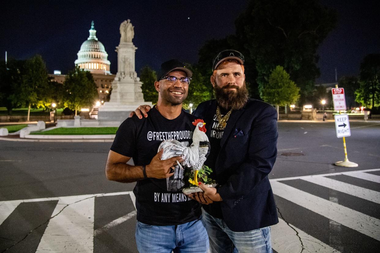 Proud Boys chairman Enrique Tarrio stands in front of the US Capitol holding a model rooster   (Amy Harris/Shutterstock)