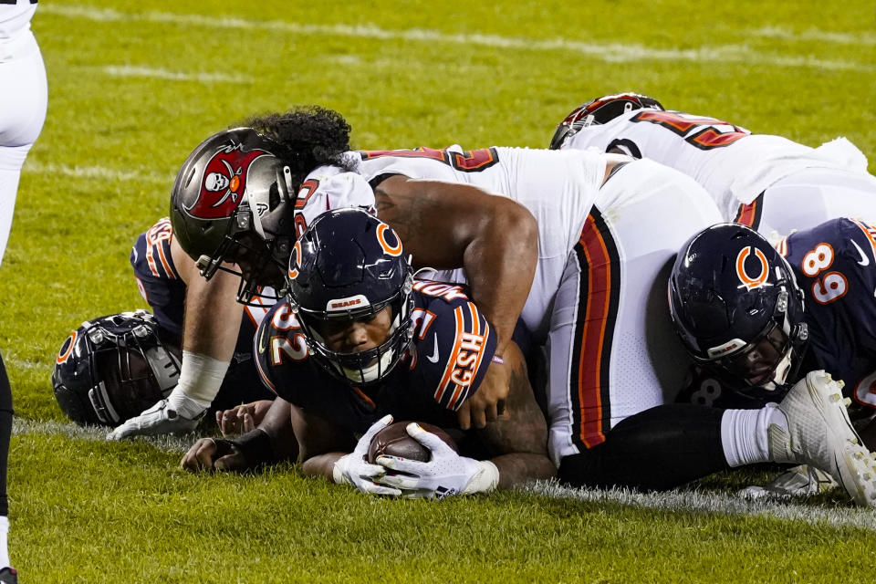 Chicago Bears running back David Montgomery (32) is tackled in the end zone by Tampa Bay Buccaneers nose tackle Vita Vea (50) after a touchdown. (AP Photo/Nam Y. Huh)