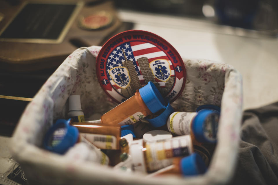 Image: A basket filled with medication taken daily by Jennifer Waddleton at her home on Sept. 9, 2021 in Lehigh Acres, Fla. (Saul Martinez for NBC News)