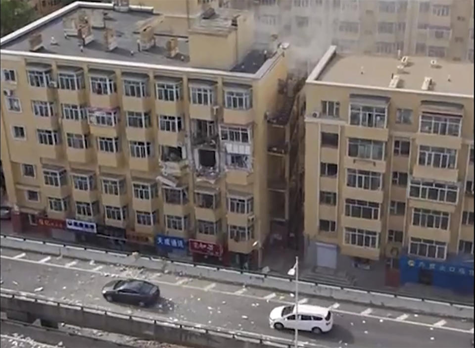 In this image taken from video, the aftermath of an explosion at an apartment building is seen in Harbin in northeastern China's Heilongjiang province on Thursday, May 23, 2024. State media say an explosion at an apartment building in Harbin, a city in northeastern China, has killed one person and injured at least three others. (UGC via AP)