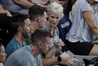 Andy Murray's mother Judy Murray, and his brother Jamie watch his first round match against Spain's Roberto Bautista Agut at the Australian Open tennis championships in Melbourne, Australia, Monday, Jan. 14, 2019. (AP Photo/Mark Schiefelbein)