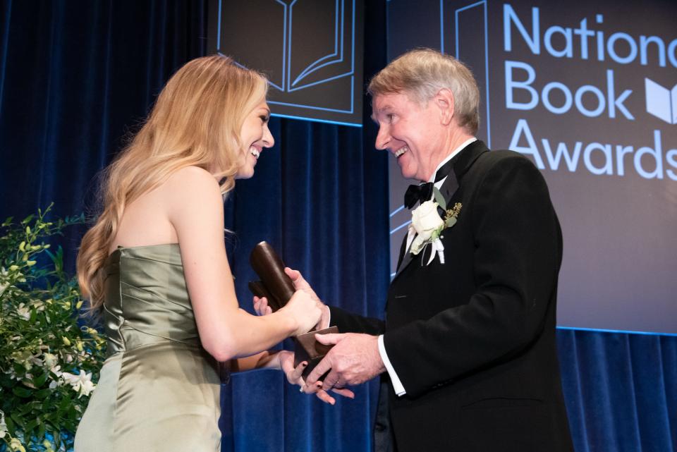 South Bend native Tess Gunty accepts the National Book Award for fiction for her debut novel, "The Rabbit Hutch," at the 73rd National Book Awards Dinner and Ceremony on Nov. 16, 2022, at Cipriani Wall Street in New York City.