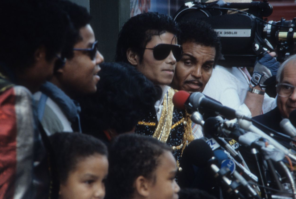 Joe Jackson tries to stay close to his son at Michael’s 1984 induction into the Hollywood Walk Of Fame. Source: Getty