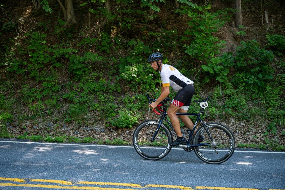 Les Crook of Mishawaka climbs a hill in Pennsylvania on the Race Across America in June 2022.