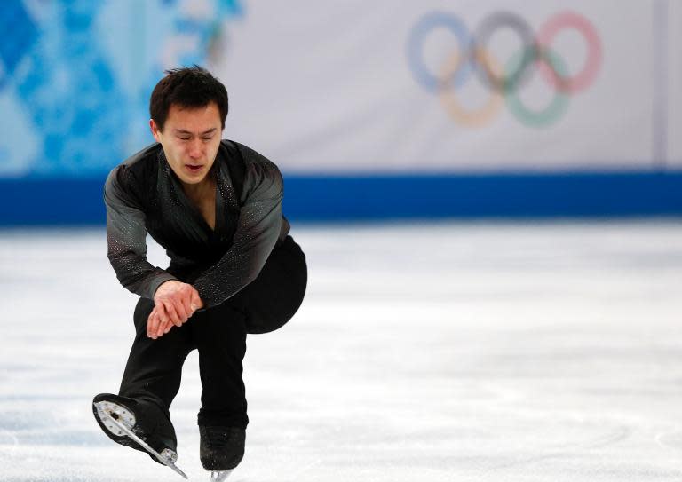 Canada's Patrick Chan performs in the Men's Figure Skating Team Short Program during the Sochi Winter Olympics on February 6, 2014