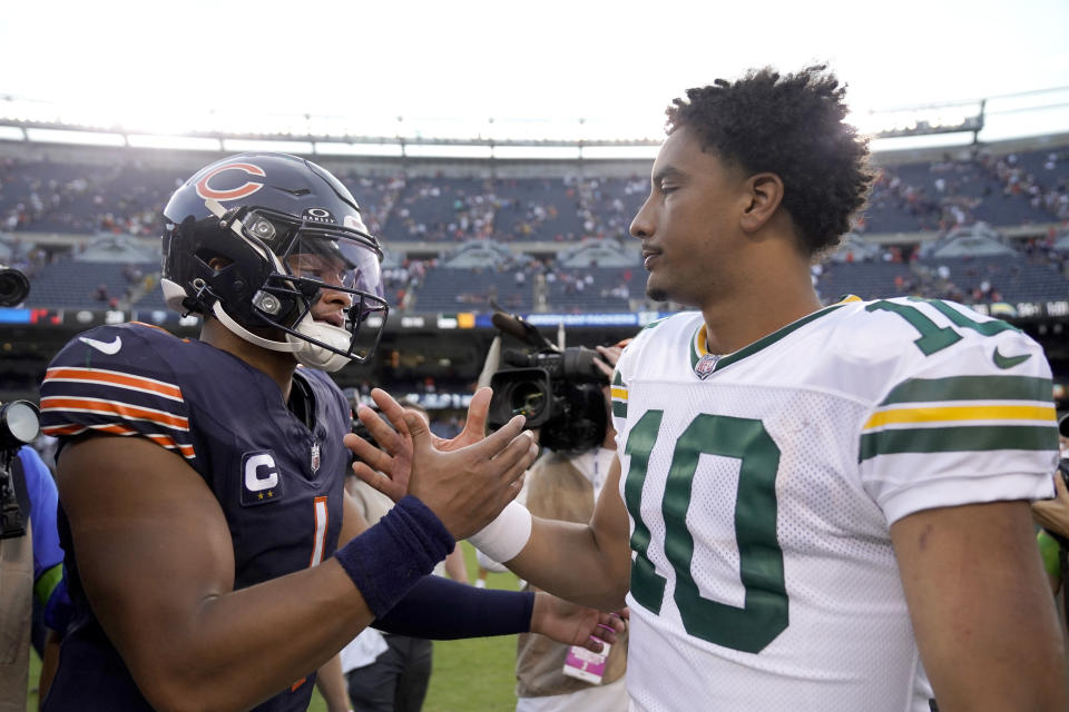 Chicago Bears quarterback Justin Fields, left, and Green Bay Packers quarterback Jordan Love shake hands after the Packers 38-20 win over the Bears an NFL football game Sunday, Sept. 10, 2023, in Chicago. (AP Photo/Erin Hooley)