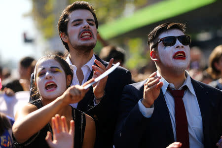 Demonstrators shout slogans during a protest calling for changes in the education system in Santiago, Chile April 11, 2017. REUTERS/Ivan Alvarado