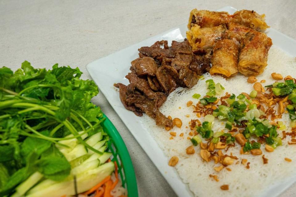 Bánh hoi thit nuong cha giò is ready to serve at Com Tam Dat Thanh on Thursday in south Sacramento. It consists of a thin layer of rice vermicelli with barbecue pork and egg rolls, served with cilantro, cucumber and pickled carrots and daikon.