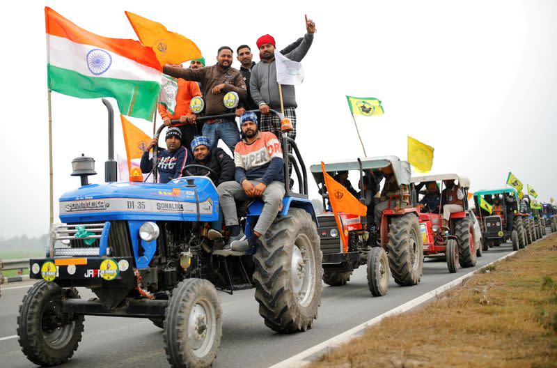 FILE PHOTO: Rally to protest against the newly passed farm bills, on a highway on the outskirts of New Delhi