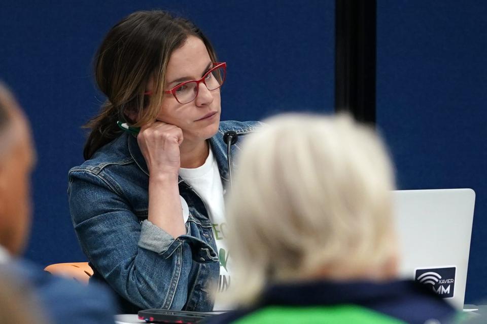 Forest Hills School District board member Leslie Rasmussen listens to during a meeting, Wednesday, May 18, 2022, at Nagel Middle School in Anderson Township, Ohio. 