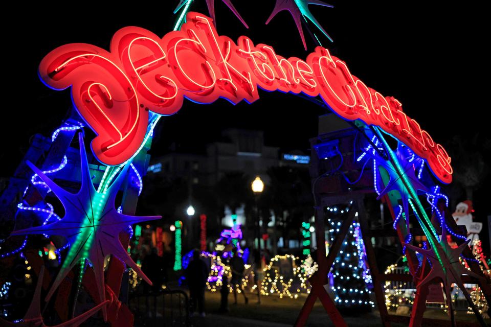 The entrance to the annual Deck the Chairs at Latham Plaza Park in Jacksonville Beach in 2022. The holiday event features illuminated lifeguard chairs and other festive decor with more than 40,000 lights on display.