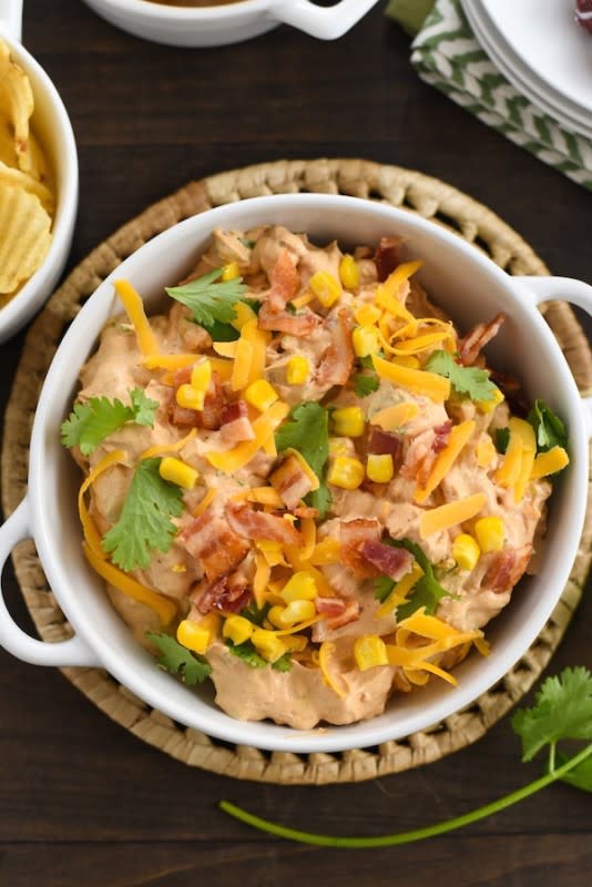 <p>Foxes Love Lemons</p><p>Are you missing the flavors of summer already? No worries! This Smoky Barbecue Chicken, Bacon, and Corn Dip make the transition to fall a little easier. </p><p><strong>Get the recipe: <a href="http://foxeslovelemons.com/smoky-barbecue-chicken-bacon-corn-dip/" rel="nofollow noopener" target="_blank" data-ylk="slk:Smoky Barbecue Chicken, Bacon and Corn Dip;elm:context_link;itc:0;sec:content-canvas" class="link rapid-noclick-resp">Smoky Barbecue Chicken, Bacon and Corn Dip</a></strong></p>