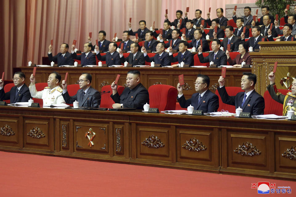 In this photo provided by the North Korean government, North Korean leader Kim Jong Un, bottom center, attends a ruling party congress in Pyongyang, North Korea Tuesday, Jan. 12, 2021. Kim vowed all-out efforts to bolster his country's nuclear deterrent during the major ruling party meeting where he earlier laid out plans to work toward salvaging the broken economy. Independent journalists were not given access to cover the event depicted in this image distributed by the North Korean government. The content of this image is as provided and cannot be independently verified. Korean language watermark on image as provided by source reads: "KCNA" which is the abbreviation for Korean Central News Agency. (Korean Central News Agency/Korea News Service via AP)