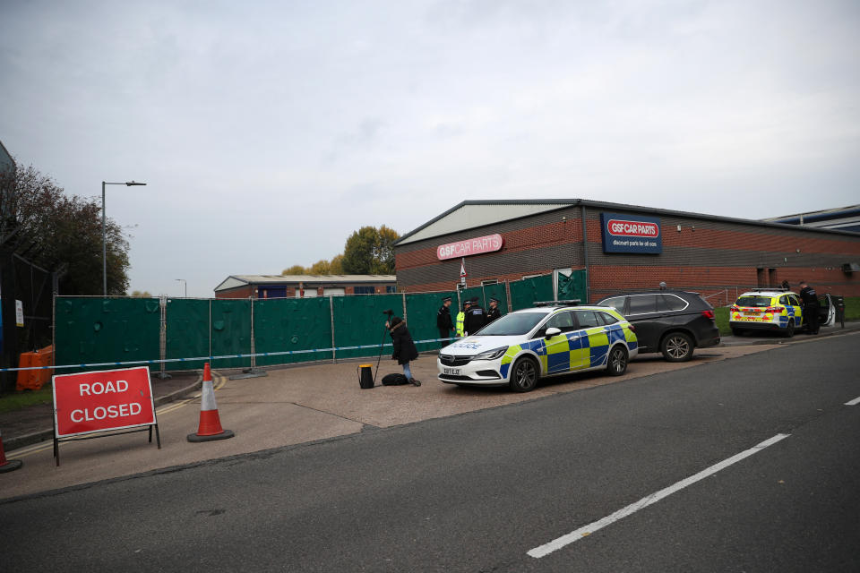 Police officers are seen at the scene where bodies were discovered in a lorry container, in Grays, Essex, Britain October 23, 2019.  REUTERS/Hannah McKay