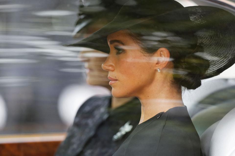 Meghan Markle in a car as she trails behind Queen Elizabeth's casket.