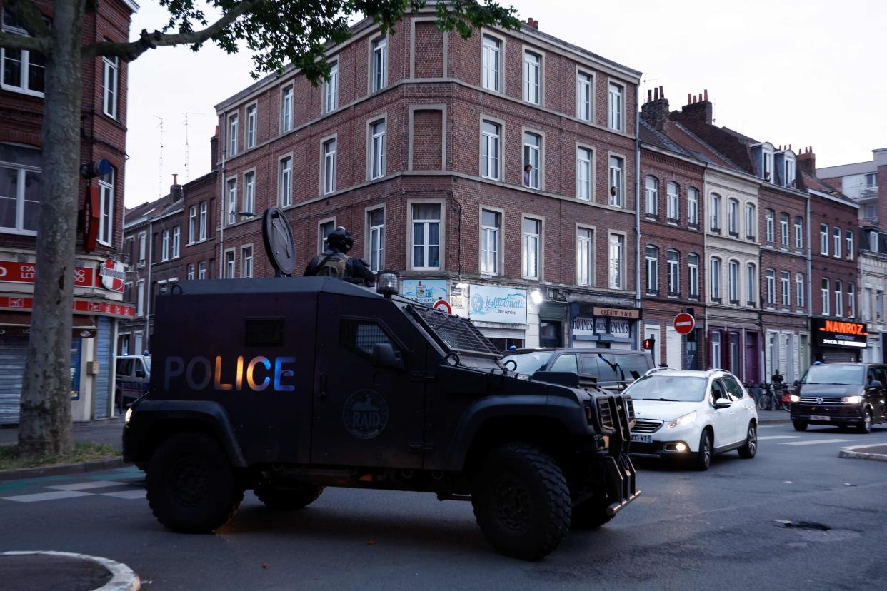 A police anti-riot vehicle of the unit RAID (Research, Assistance, Intervention, deterrence (AFP via Getty Images)