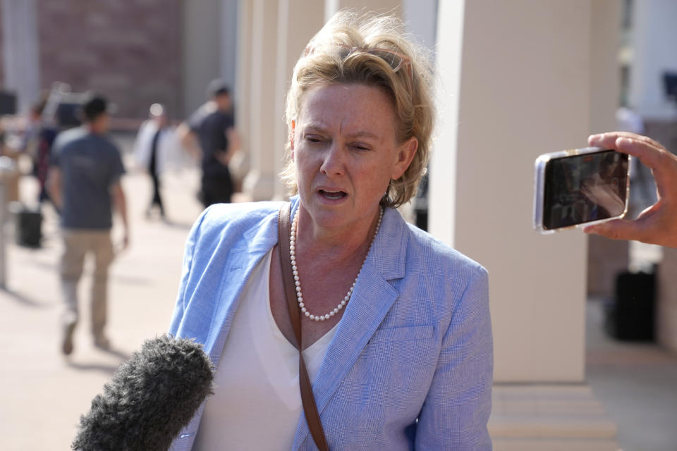 Prosecutor Kari Morrissey leaves court after jury selection in Actor Alec Baldwin's involuntary manslaughter trial, Tuesday, July 9, 2024, in Santa Fe, N.M. (AP Photo/Ross D. Franklin)