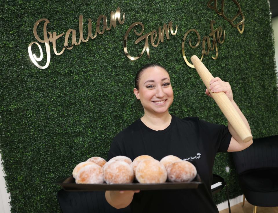 Jessica Gemma, owner of Italian Gem Cafe, made a tray of bomboloni pastry on Friday, Nov. 10, 2023.