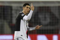 Juventus' Cristiano Ronaldo reacts during the Champions League Group D soccer match between Bayer Leverkusen and Juventus at the BayArena in Leverkusen, Germany, Wednesday, Dec. 11, 2019. (AP Photo/Martin Meissner)
