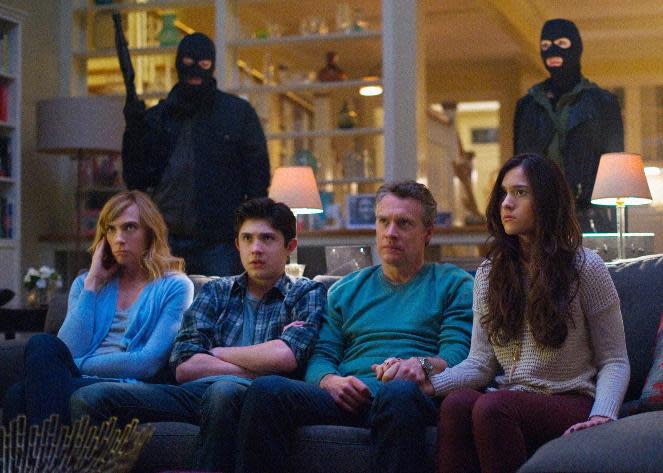 This publicity image released by CBS shows, seated from left, Toni Collette, Mateus Ward, Tate Donovan, and Quinn Shephard in a scene from "Hostages," premiering Monday, Sept 23 at 10 p.m. EST on CBS. (AP Photo/CBS, Nicole Rivelli)