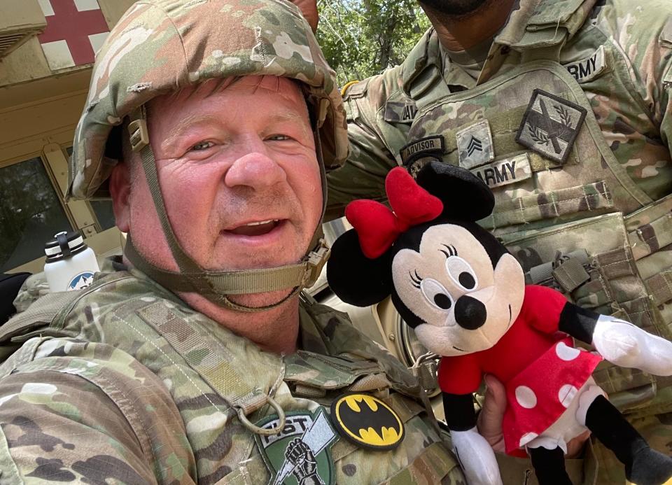 U.S. National Guard Capt. Marc Lhowe's granddaughter gave him this Minnie Mouse toy to have with him when he's traveling. Lhowe has brought the toy with him around the world, taking photos and videos to post on his social media platforms.
