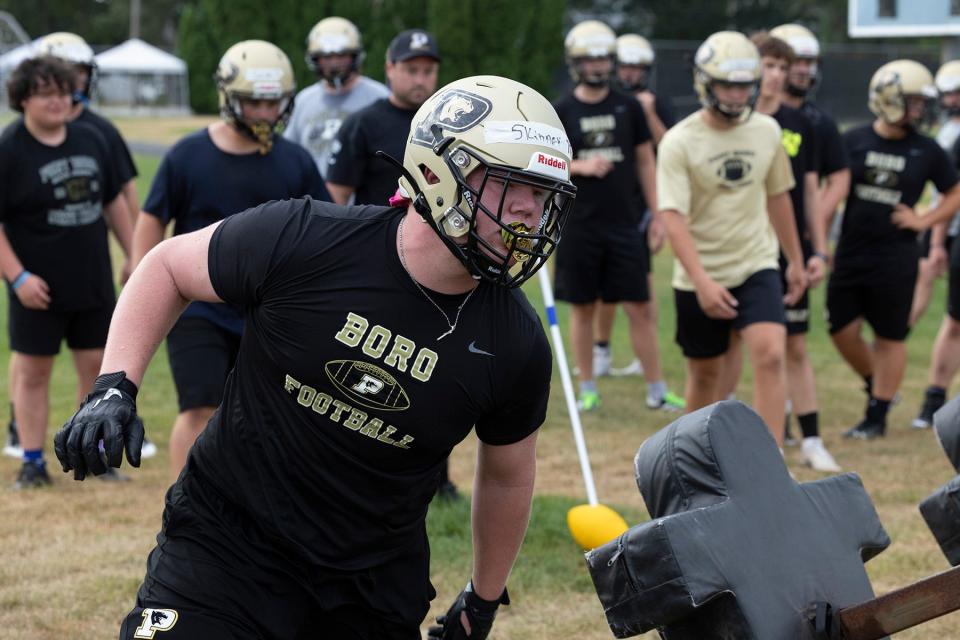 Lineman Cole Skinner does drills in practice. Point Pleasant Borough High School football practice for upcoming 2022 season on July 26, 2022 in Point Pleasant NJ. 