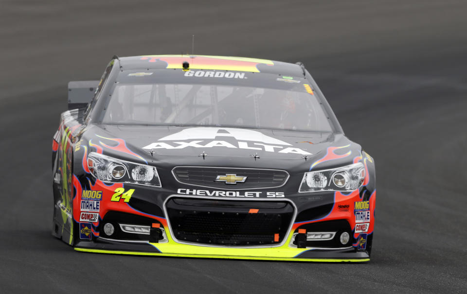 Jeff Gordon drives through Turn 1 during the Brickyard 400 auto race at Indianapolis Motor Speedway in Indianapolis, Sunday, July 27, 2014. (AP Photo/Tom Strattman)