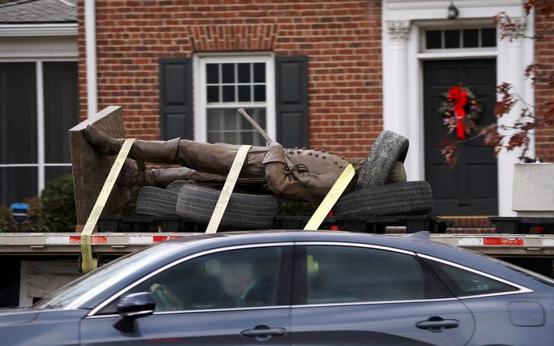 Statue of Confederate General A.P. Hill is removed from its plinth in Richmond