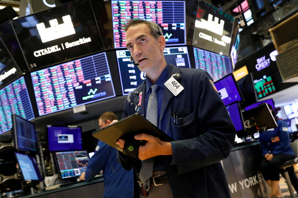 Traders work on the floor at the New York Stock Exchange (NYSE) in New York, U.S., September 12, 2019. REUTERS/Brendan McDermid