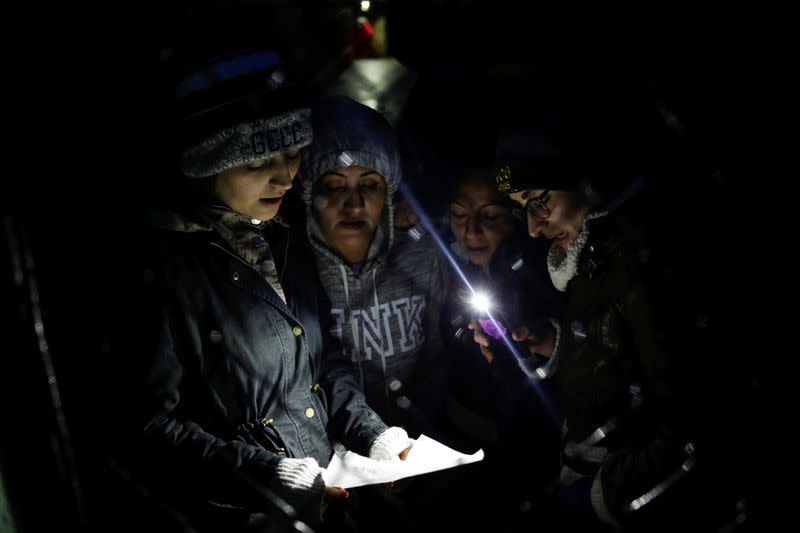 Mariela Ramirez and her sisters sing during a posada at their farm in Jalpan de Serra