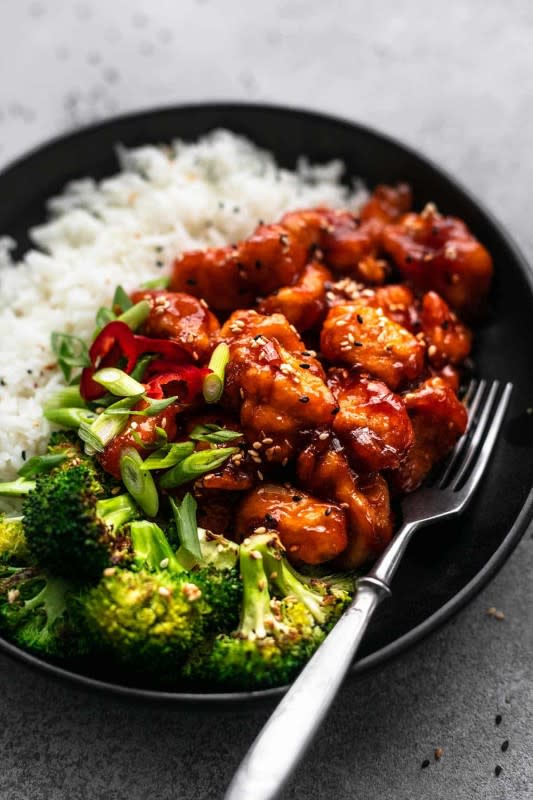 <p>Le Creme de La Crumb</p><p>This better-than-takeout, 30-minute sticky sesame chicken is so super easy to make and so ridiculously delicious, you’ll never need to order this Chinese takeout dish again.</p><p><strong>Get the recipe: <a href="https://www.lecremedelacrumb.com/sticky-sesame-chicken-30-minutes/" rel="nofollow noopener" target="_blank" data-ylk="slk:Sticky Sesame Chicken;elm:context_link;itc:0;sec:content-canvas" class="link rapid-noclick-resp">Sticky Sesame Chicken</a></strong></p>