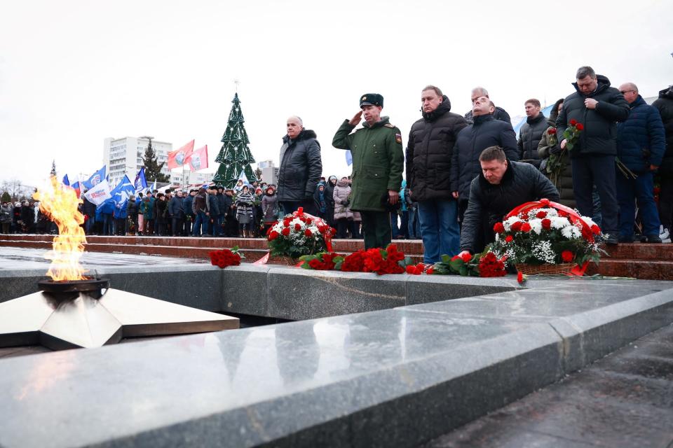 Russian mourners ceremony military Makiivka Donetsk Ukraine