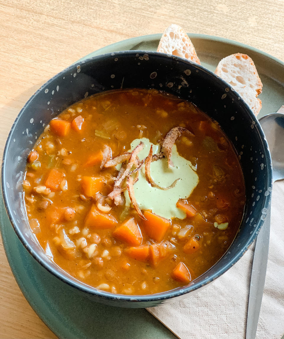 bowl of soup with lentils in it