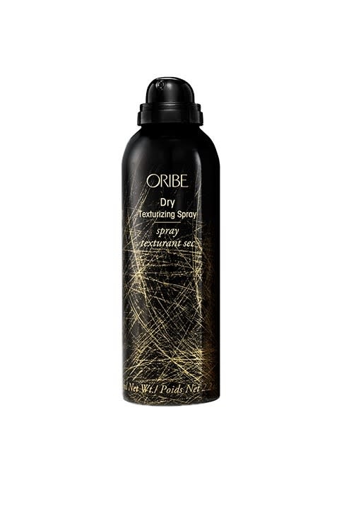 <p>Oribe Dry Texturizing Spray</p><p>This multi-purpose wonder spray is adored by women of all hair types, so a mini purse-sized version is highly giftable. <a href="http://www.oribe.com/dry-texturizing-spray.html" rel="nofollow noopener" target="_blank" data-ylk="slk:Oribe Dry Texturizing Spray" class="link rapid-noclick-resp">Oribe Dry Texturizing Spray</a> ($22)<br><br></p>
